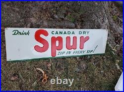 C. 1950s Original Vintage Drink Canada Dry Spur Sign Metal Embossed Soda Zip Sip