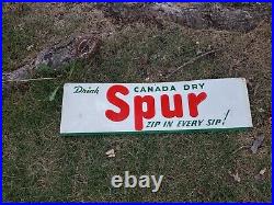 C. 1950s Original Vintage Drink Canada Dry Spur Sign Metal Embossed Soda Zip Sip