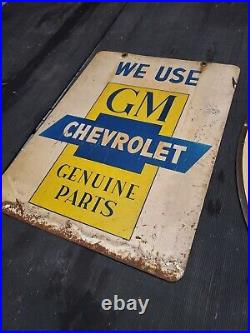 C. 1950s Original Vintage We Use GM Chevrolet Genuine Parts Sign 2 Sided Metal