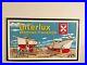 RARE-VINTAGE-1950-s-INTERLUX-MARINE-FINISHES-DEALERSHIP-EMBOSSED-TIN-ADV-SIGN-01-cp