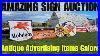 Searching-For-Deals-At-An-Estate-Auction-Full-Of-Vintage-Advertising-Signs-01-nhal