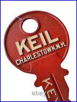 Vintage Cast Iron Red Painted Trade Advertising Sign Keil Key Charlestown NH