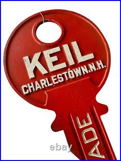 Vintage Cast Iron Red Painted Trade Advertising Sign Keil Key Charlestown NH