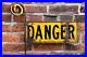 Vintage-Danger-Sign-railroad-keep-out-metal-fence-advertising-sign-on-pole-01-ei