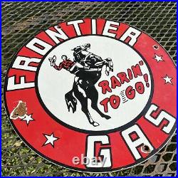 Vintage Frontier Gas Porcelain Metal Sign USA Oil Lube Station Rodeo Cowboy Man