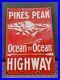 Vintage-Pike-Peak-Highway-Porcelain-Sign-Colorado-Cabin-Park-Forest-Service-Gas-01-anqg